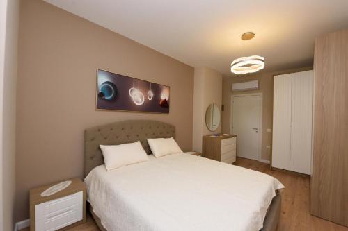 Postel nebo postele na pokoji v ubytování Eda apartment
