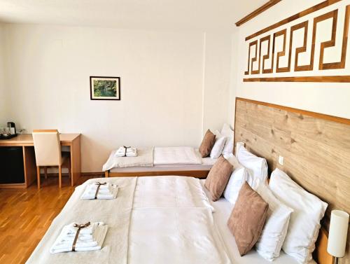 Postel nebo postele na pokoji v ubytování Plitvice Lower Lakes Rooms