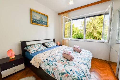 Postel nebo postele na pokoji v ubytování Apartman PIK