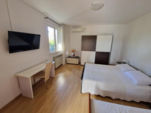 Ένα ή περισσότερα κρεβάτια σε δωμάτιο στο Apartment 2390