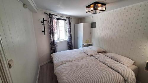 Postel nebo postele na pokoji v ubytování Apartment in Tønsberg Sentrum