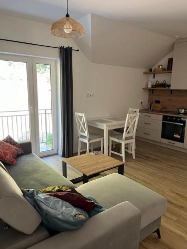 Kuchyň nebo kuchyňský kout v ubytování Apartament przy Górze Witosza