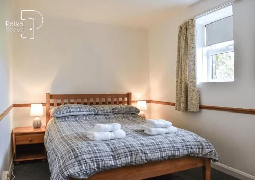 Voodi või voodid majutusasutuse Crag Barn Cottage Lake District by PolkaStays toas