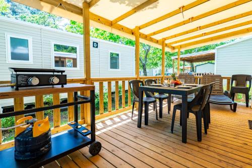 Photo de la galerie de l'établissement L'oyat du bonheur-Mobil-Home Dans un camping 4 étoiles, à Seignosse