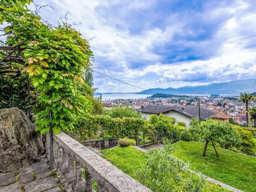 a garden with a view of a city at Holiday Home Bienna Antica by Interhome in Verbania