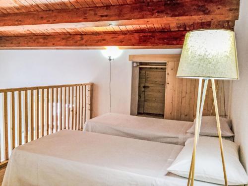 Postel nebo postele na pokoji v ubytování Apartment Centro by Interhome