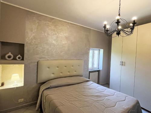 Ένα ή περισσότερα κρεβάτια σε δωμάτιο στο Holiday Home La casa di Bibi by Interhome