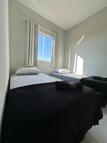 Postel nebo postele na pokoji v ubytování Apartamento em Penha próximo Beto Carrero e Praia