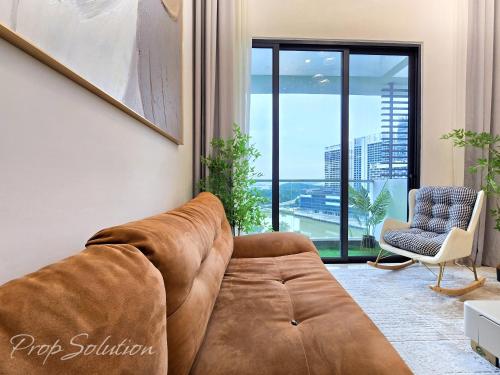 Un lugar para sentarse en Loft Suite 3BR Johor Bahru Legoland 8-9Pax