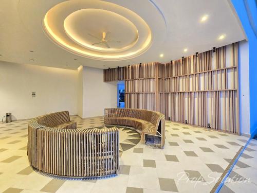 Un lugar para sentarse en Loft Suite 3BR Johor Bahru Legoland 8-9Pax