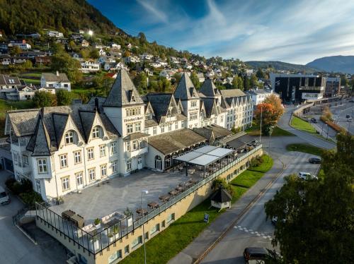 an aerial view of a large building in a city at Fleischer's Hotel in Vossevangen