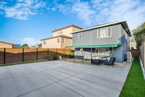 a house with a patio and a fence at Daly city 3B Home Great location in Daly City