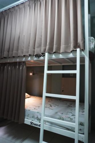 Little Malang Hostel小玛瑯青年旅舍にあるベッド