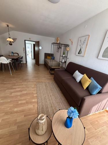 a living room with a couch and a table at Apartment Theresa in Bad Goisern