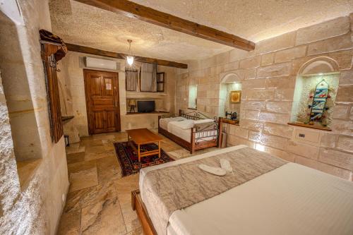 Letto o letti in una camera di Osmanbey Cave House
