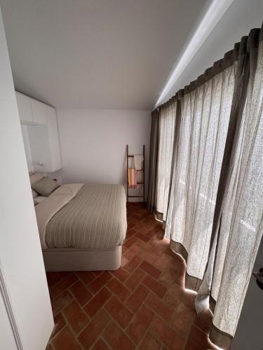 Stylish townhouse with gallery in the heart of Tavira for two