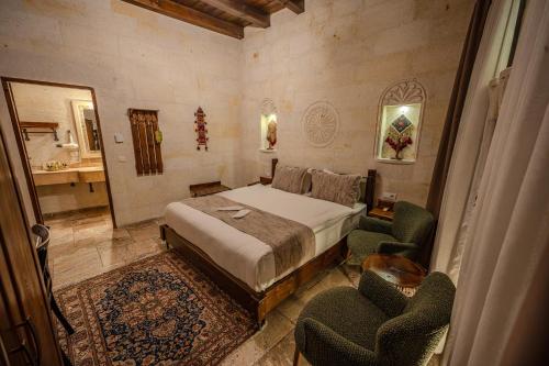 Letto o letti in una camera di Osmanbey Cave House