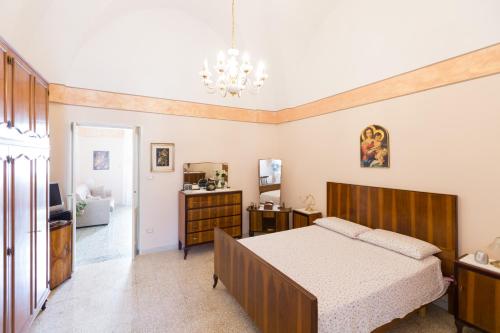 A bed or beds in a room at Casa vacanza Nonna Emma