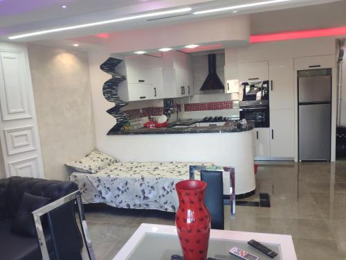 Kuchyň nebo kuchyňský kout v ubytování Joli Grand F2 Bejaia 39 à 69eur