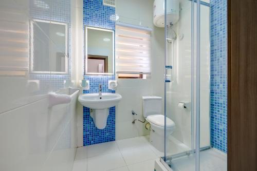 Un baño de Sir William Reid Apartments
