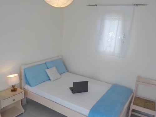 a small bed with a black box on it at Mini City Center Studio in Rhodes Town