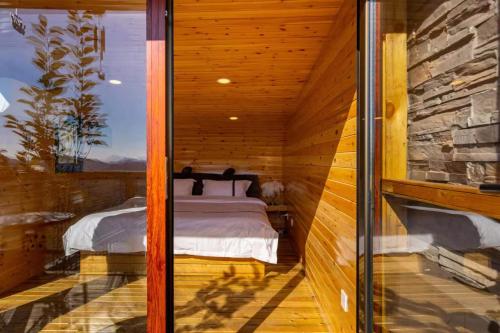 Katil atau katil-katil dalam bilik di Dream Back Great Wall Boutique Villas in Beijing's Gubei Water Town