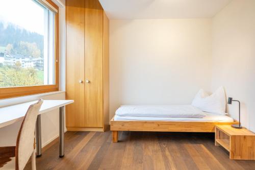 Katil atau katil-katil dalam bilik di Edelweiss Ferienwohnung, Panoramablick