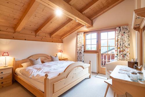 Ένα ή περισσότερα κρεβάτια σε δωμάτιο στο Edelweiss Casa Miez Penthouse