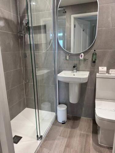 a bathroom with a shower and a sink at The Ship Inn - Sandgate in Folkestone