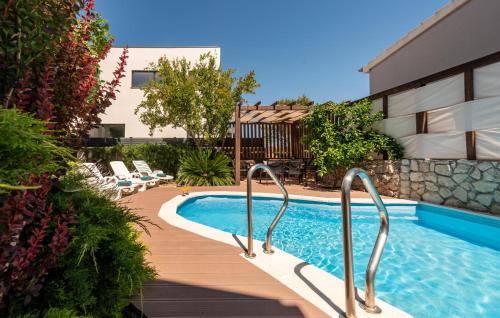 Πισίνα στο ή κοντά στο Four-Bedroom Holiday Home In Vir