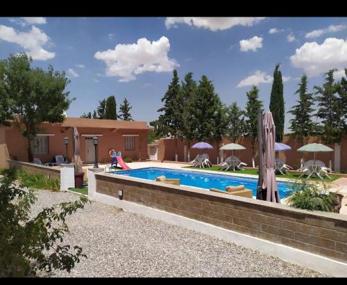 Swimmingpoolen hos eller tæt på La pergola