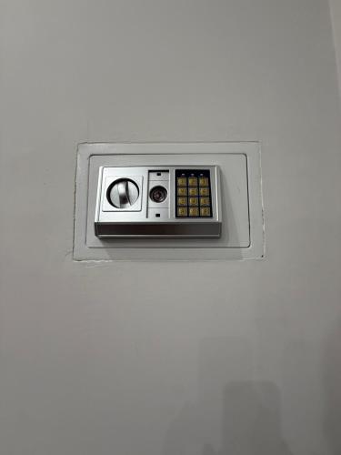 a lightswitch on a wall in a room at Palazzo Valentino in Naples
