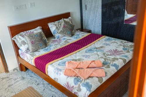 Postel nebo postele na pokoji v ubytování Rajashree Guest House