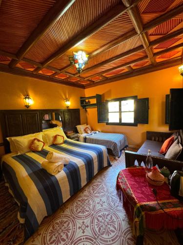Cama o camas de una habitación en Riad Jnane Imlil