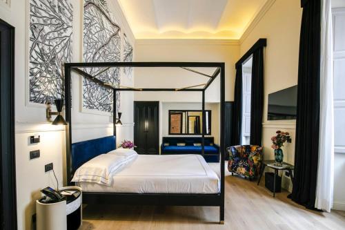 Katil atau katil-katil dalam bilik di Roma Luxus Hotel