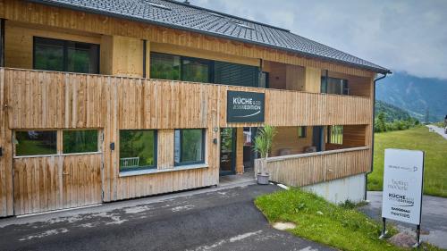 a building with a sign in front of it at Bocks Apartments 53C in Wald am Arlberg