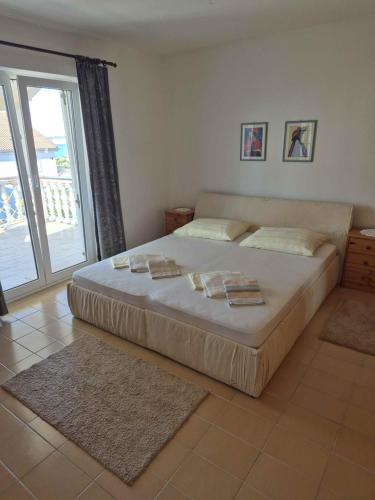 Katil atau katil-katil dalam bilik di Appartements Slavica