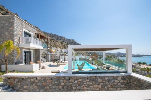 a villa with a view of the ocean at Elements Villas in Lardos