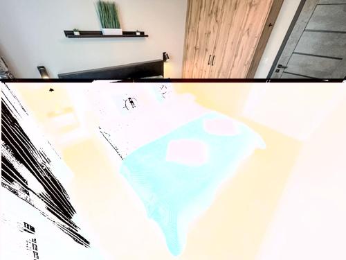 a drawing of a fish on a wall at Apartment Gąski by Interhome in Gąski