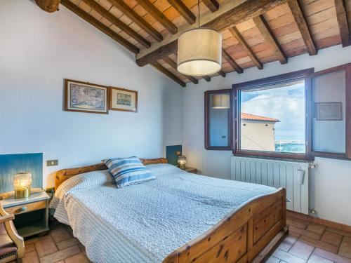 Ένα ή περισσότερα κρεβάτια σε δωμάτιο στο Apartment Rosmarina by Interhome