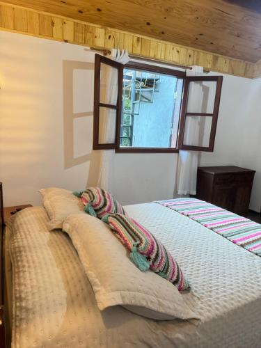 Katil atau katil-katil dalam bilik di Recanto Manacá- Monte Verde