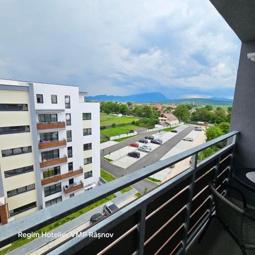 a balcony with a view of a street at Studio Râșnov VMP Free Parking in Râşnov