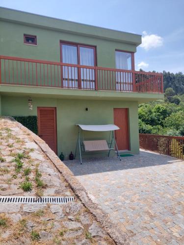 Balkoni atau teres di Refúgio das Hortênsias