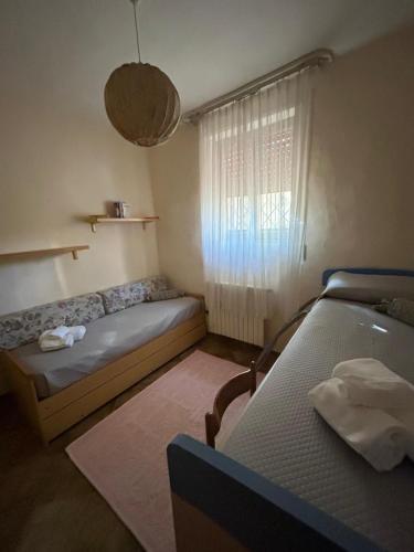 Postel nebo postele na pokoji v ubytování Casa Grace