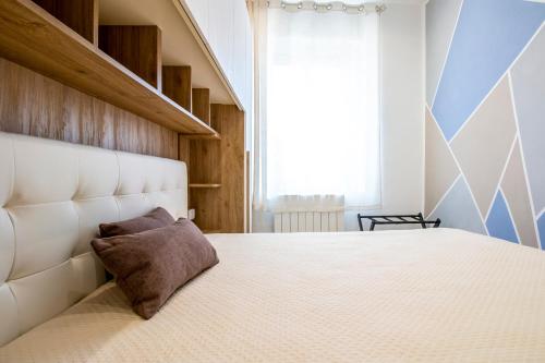 Letto o letti in una camera di La Locanda Apartment