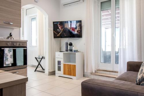 TV o dispositivi per l'intrattenimento presso La Locanda Apartment