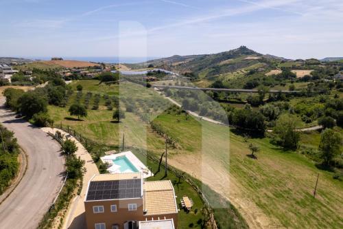 an aerial view of a house with a road at Homiday - Villa Sofia in Atri