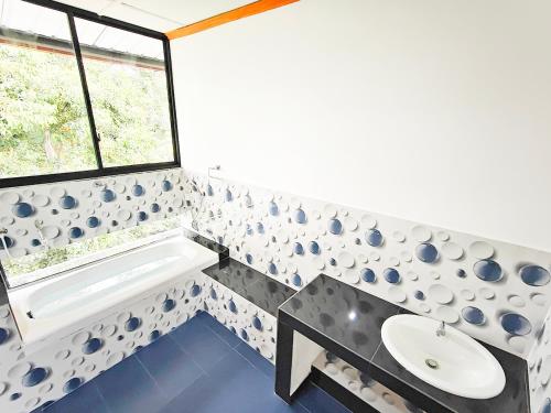 Posezení v ubytování New Nadeesha Hotel