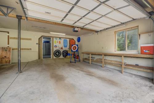 an empty garage with a large room with at Aspen Haven - Mountain Retreat BBQ Scenic Views in Divide