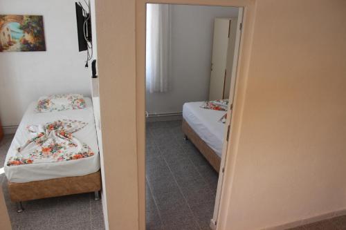 Katil atau katil-katil dalam bilik di Aydın Motel